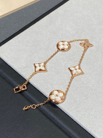 [AuraEcho]STAR AND SUN 5 MOTIF MOP PINK GOLD BRACELET