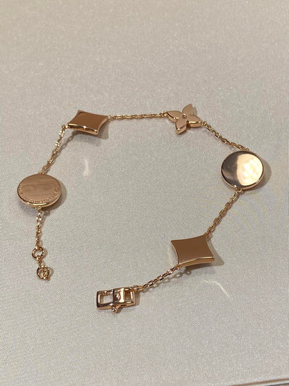 [AuraEcho]STAR AND SUN 5 MOTIF MOP PINK GOLD BRACELET