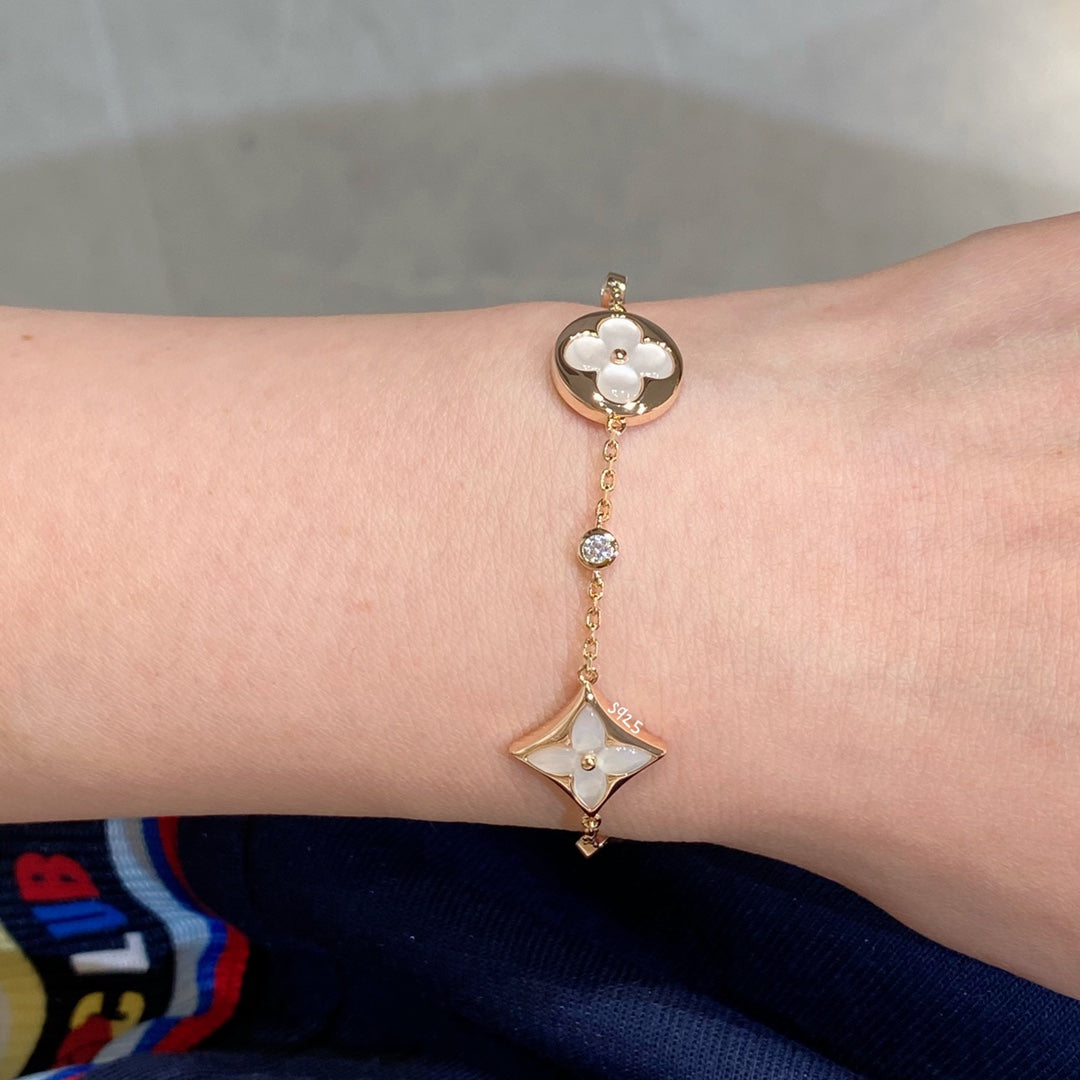 [AuraEcho]STAR AND SUN 4 MOTIF WHITE MOP PINK GOLD BRACELET