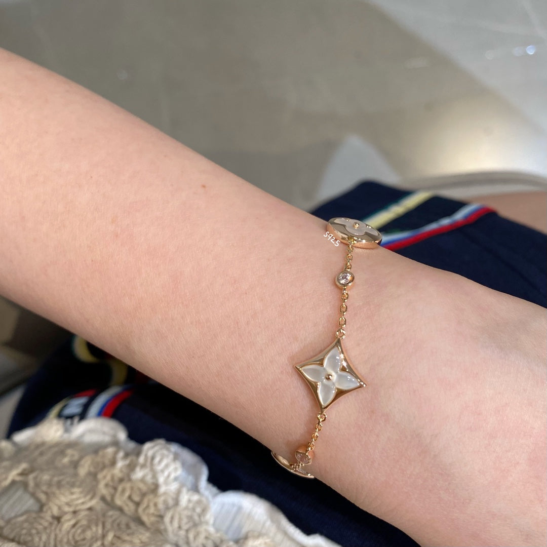 [AuraEcho]STAR AND SUN 4 MOTIF WHITE MOP PINK GOLD BRACELET